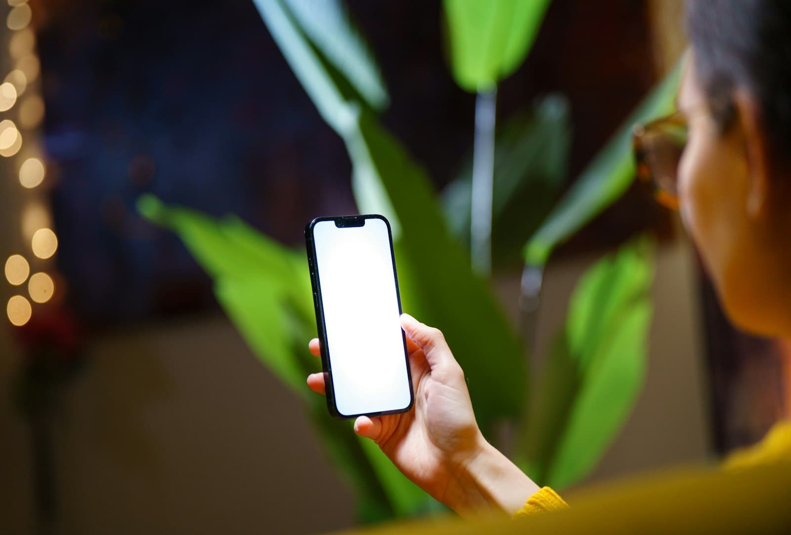 A phone held in low light